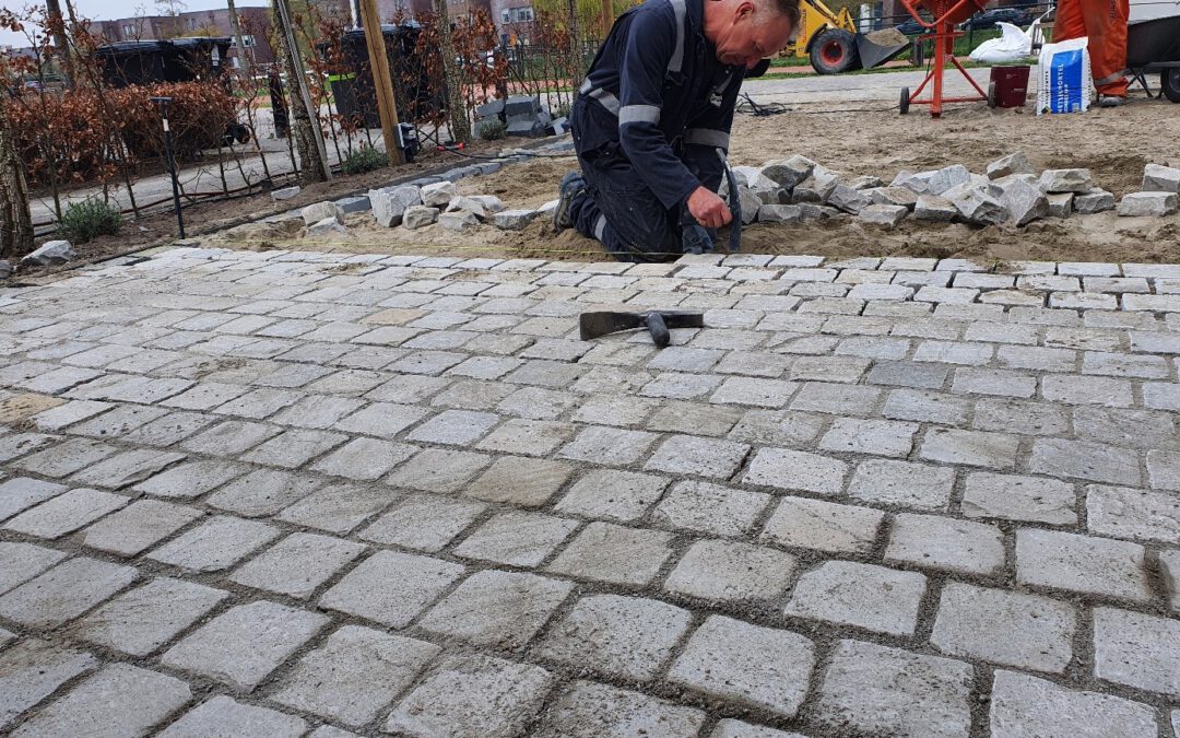 Vervangen van betonklinkers voor natuursteenkeien in zand- cement stabilisatie laag